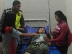 Brigadir Rian Bantu Pengawalan Ibu Hamil ke Lokasi Persalinan