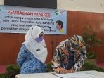 Tekan Covid-19, Ormas Bagi Ribuan Masker